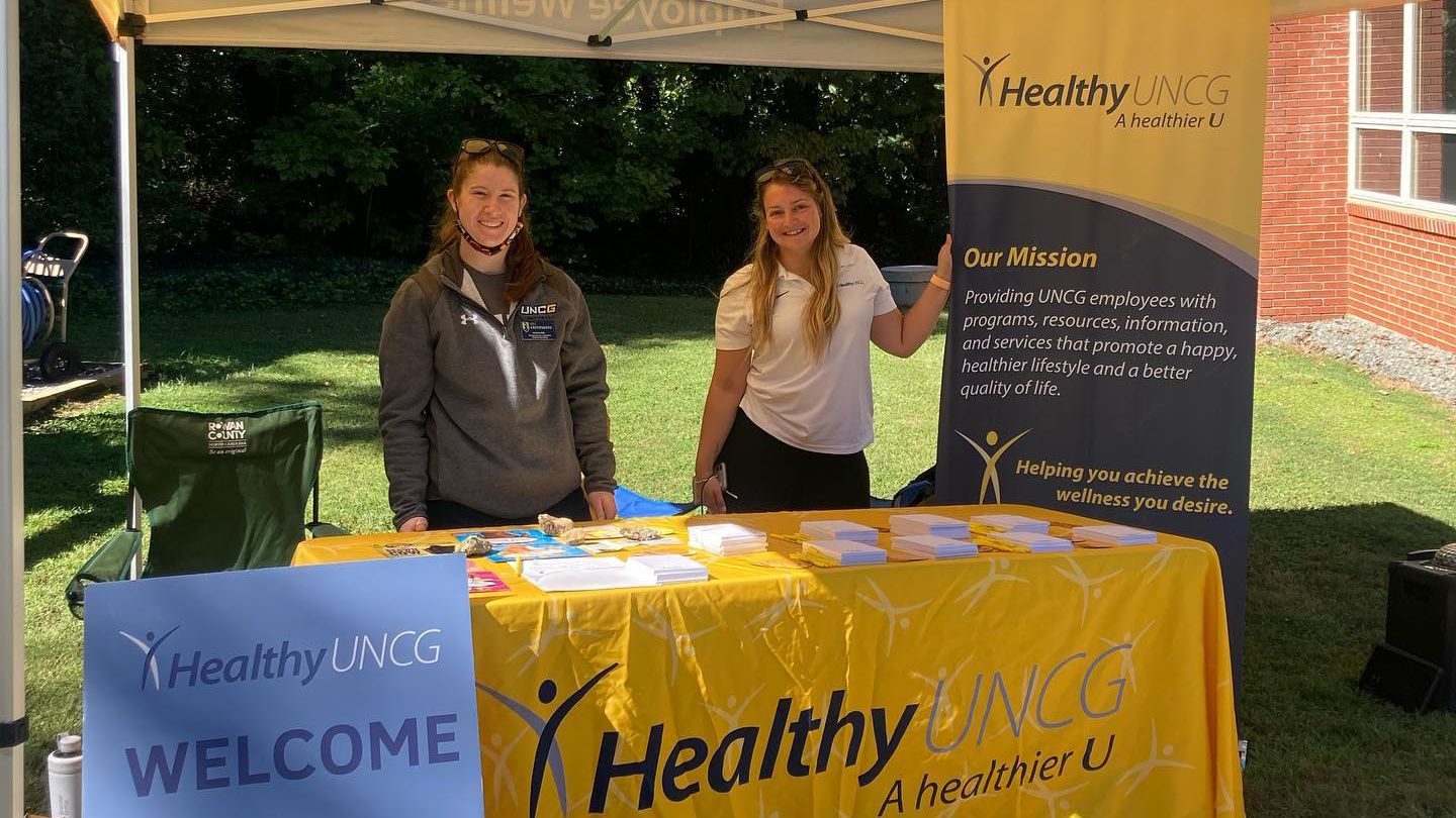 Healthy UNCG staff promoting a healthier U